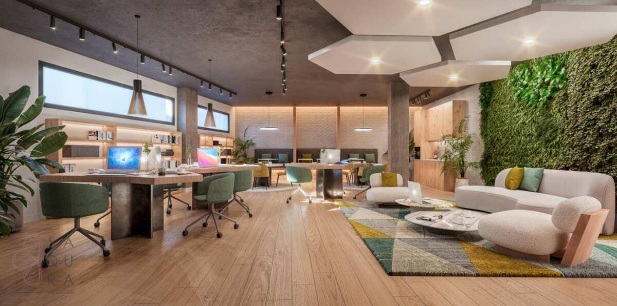 Moderner Gemeinschaftsbereich mit Arbeitsplätzen, Lounge-Ecke und vertikaler Begrünung für eine angenehme Atmosphäre.