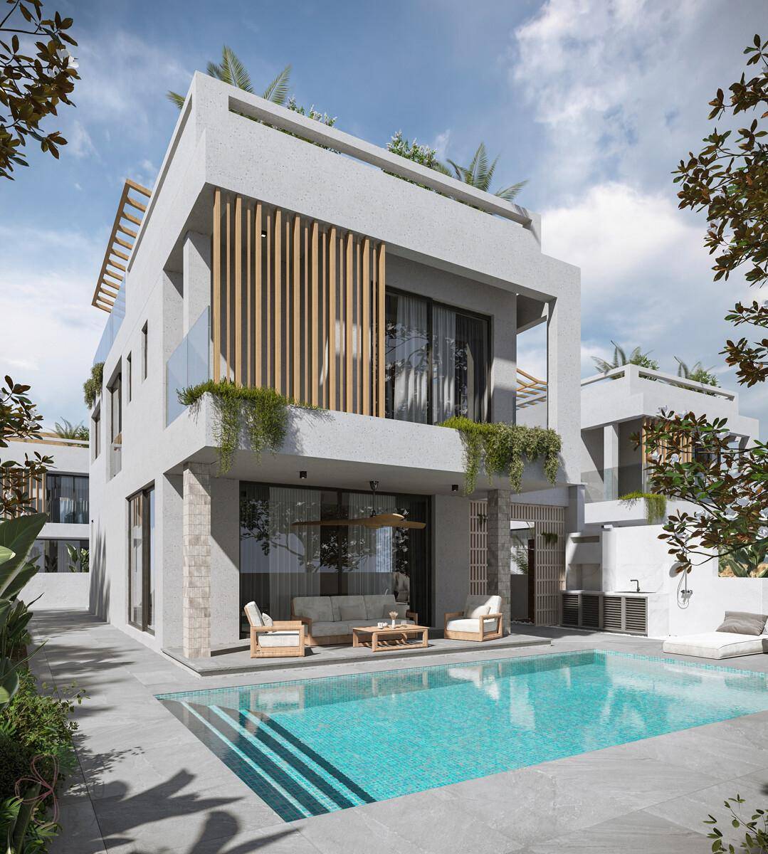 Elegante Villa mit privatem Pool, Außenküche und gemütlicher Sitzecke im Freien.