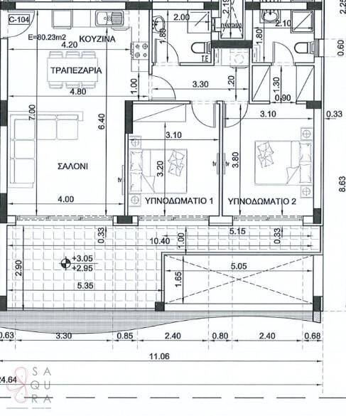 Grundrissplan einer Wohnung mit offenem Wohnbereich, zwei Schlafzimmern, zwei Bädern und einem großen Balkon.