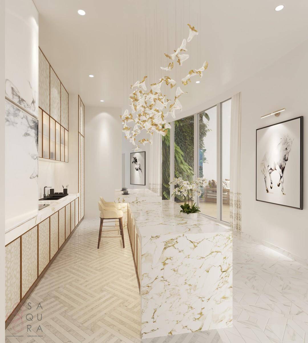 Luxuriöse Küche mit Marmorarbeitsplatten, Kücheninsel und eleganten Goldakzenten in modernem Design.