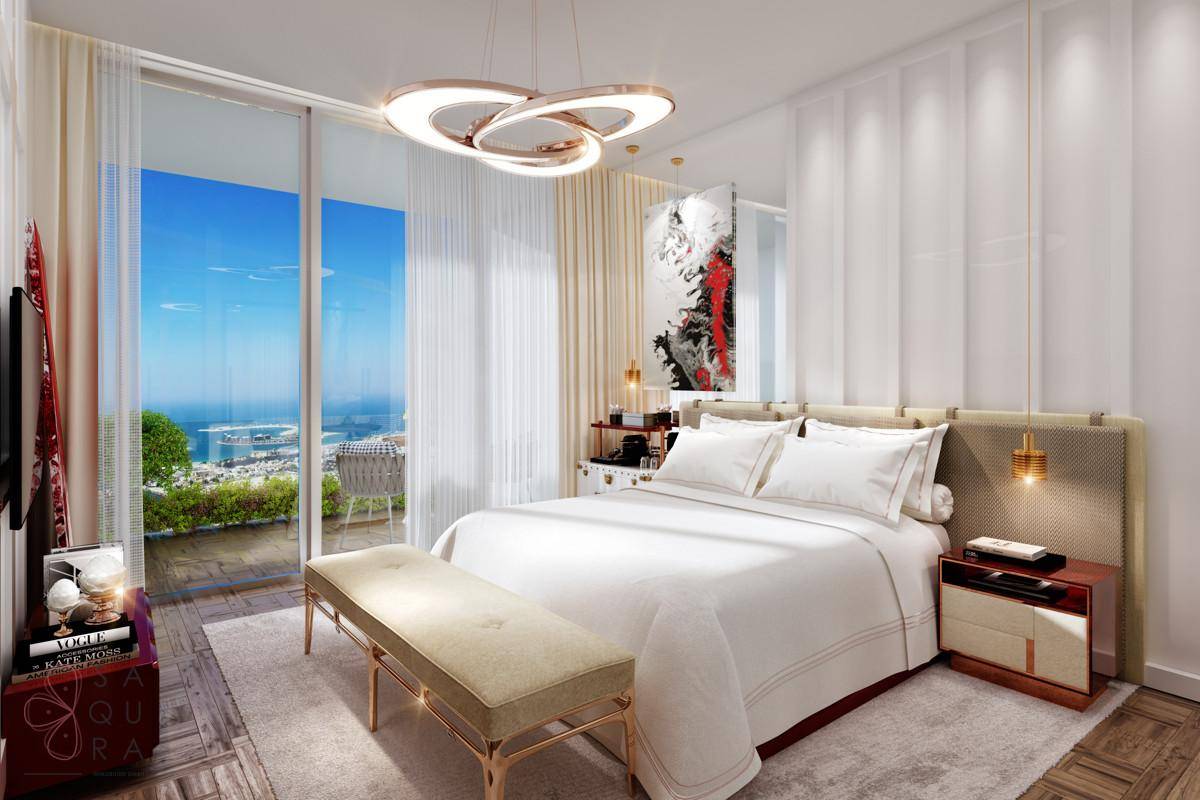 Helles Schlafzimmer mit Balkonzugang, Meerblick und moderner Einrichtung.