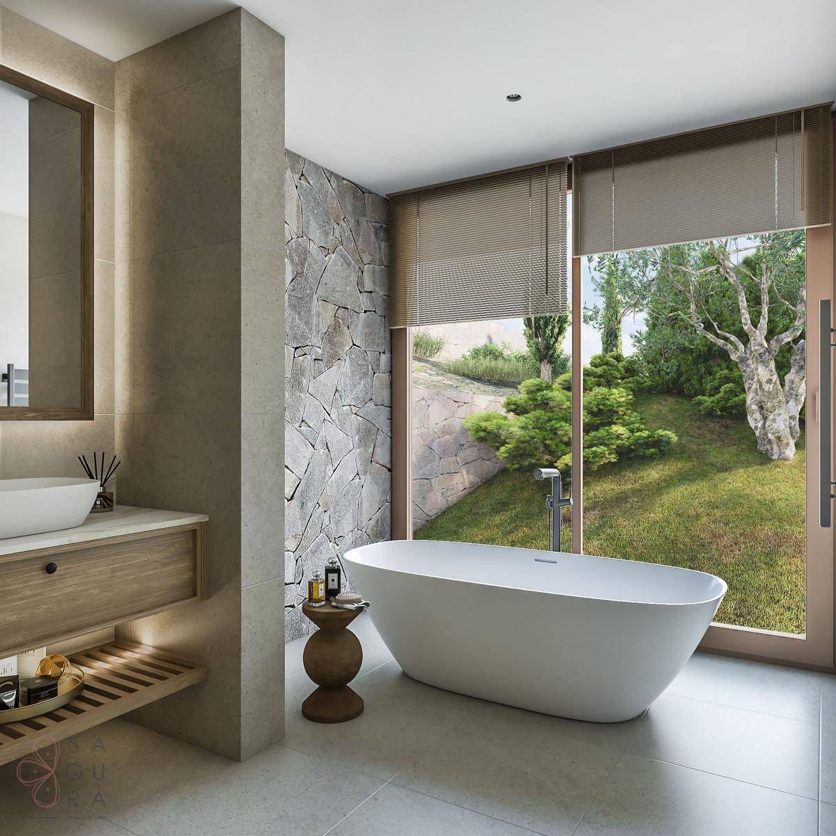 Modernes Badezimmer mit freistehender Badewanne, Natursteinwand und Blick ins Grüne.