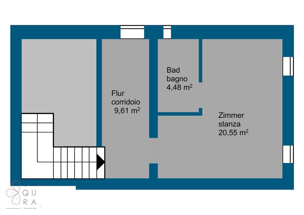 Grundriss eines Zimmers mit Bad und Flur, inklusive Treppenaufgang.