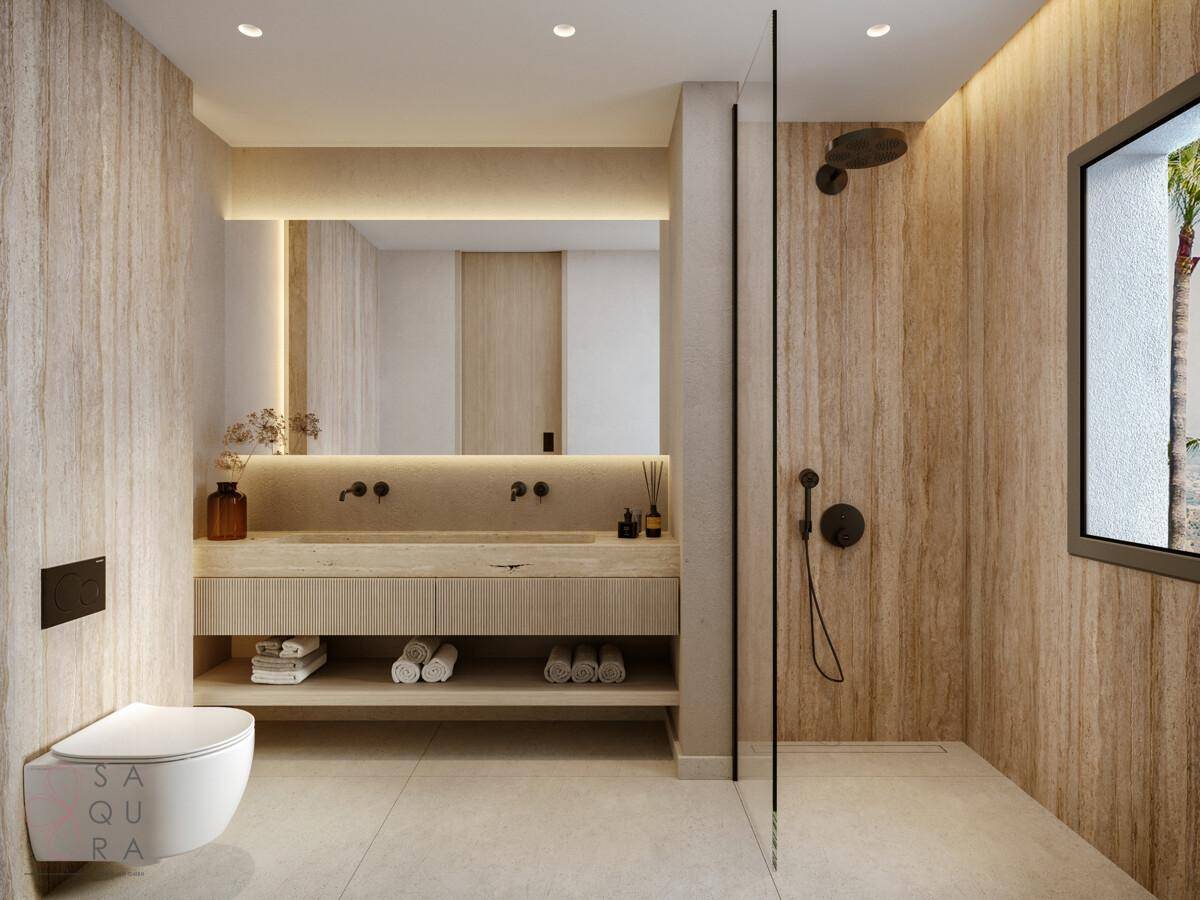 Modernes Badezimmer mit begehbarer Dusche, Doppelwaschbecken und indirekter Beleuchtung.