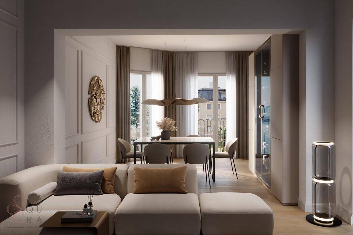 Stilvoller Wohn-Essbereich mit bequemer Couch und Essbereich mit Zugang zu einem französischen Balkon.