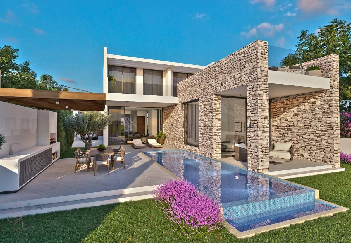 Moderne Villa mit privatem Pool, Außenküche und großzügiger Terrasse im Grünen.