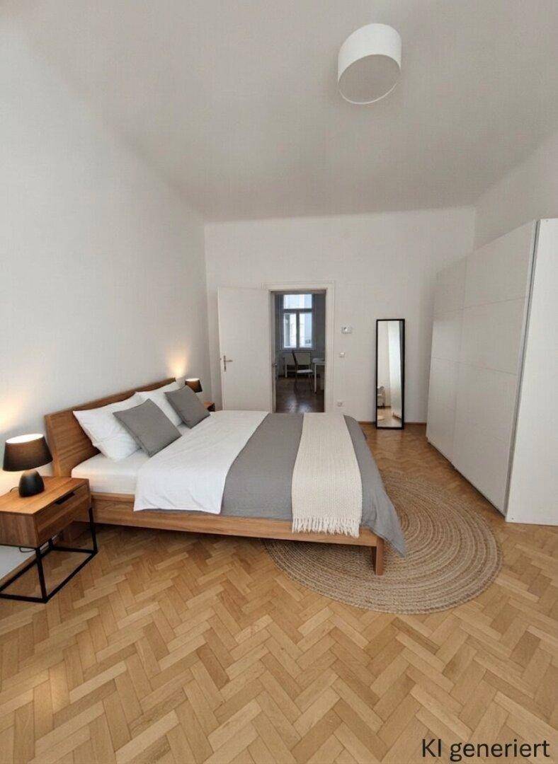Geräumiges Schlafzimmer mit Holzbett, Nachttischen und großem weißen Kleiderschrank, ausgestattet mit Parkettboden.