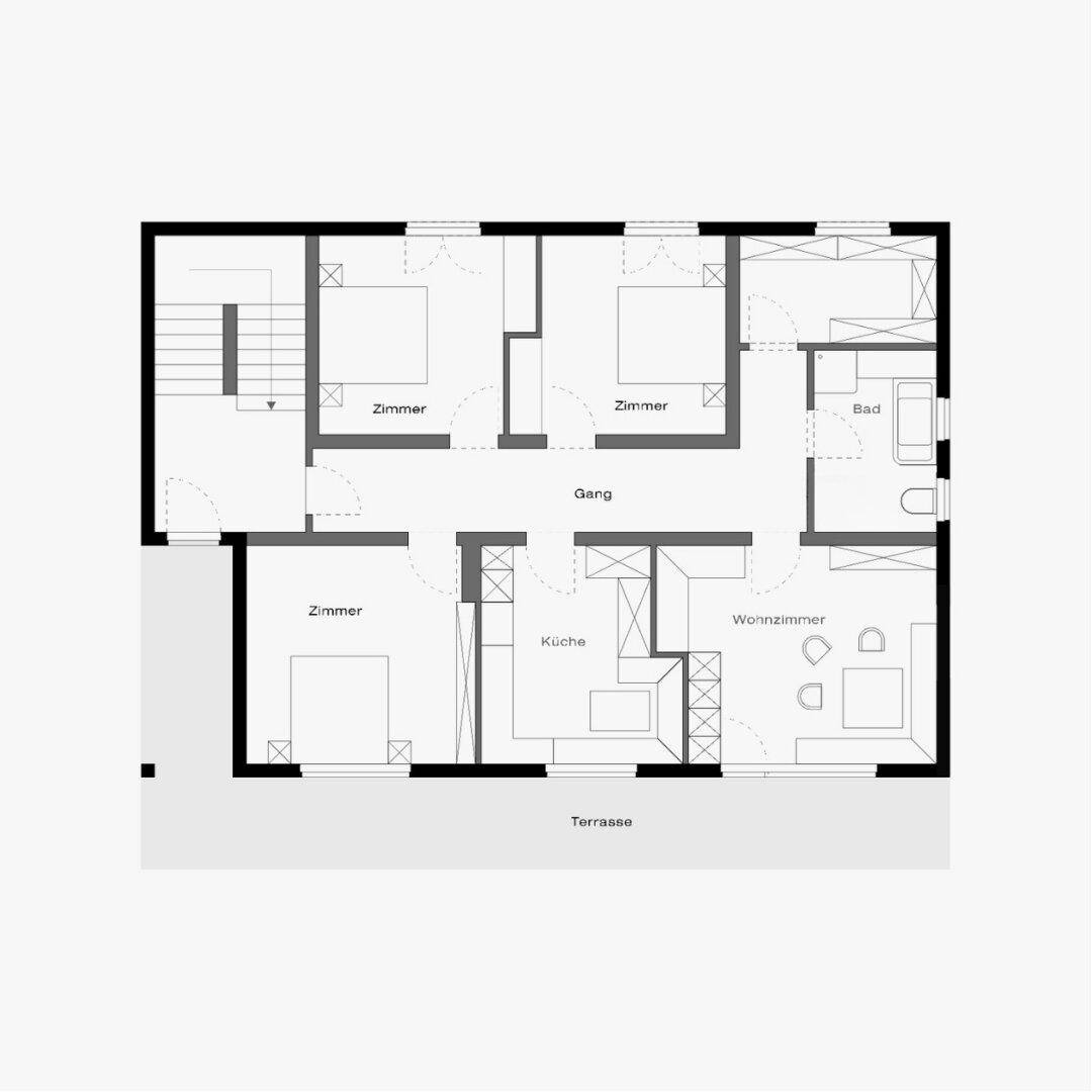Grundrissplan zeigt Zimmer, Küche, Wohnzimmer, Bad und eine Terrasse im Erdgeschoss.