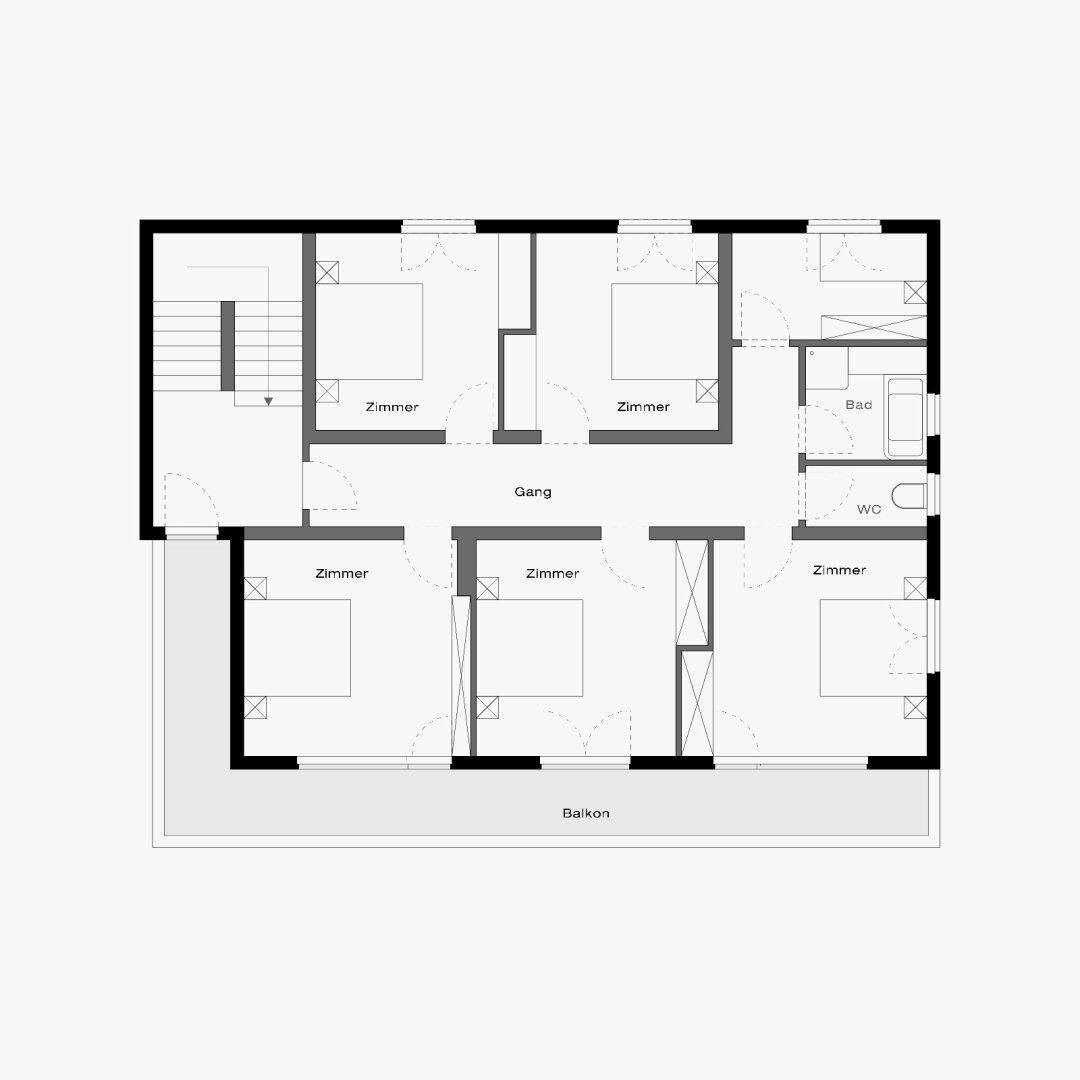 Grundrissplan zeigt mehrere Zimmer, Bad, separates WC und einen Balkon im Obergeschoss.