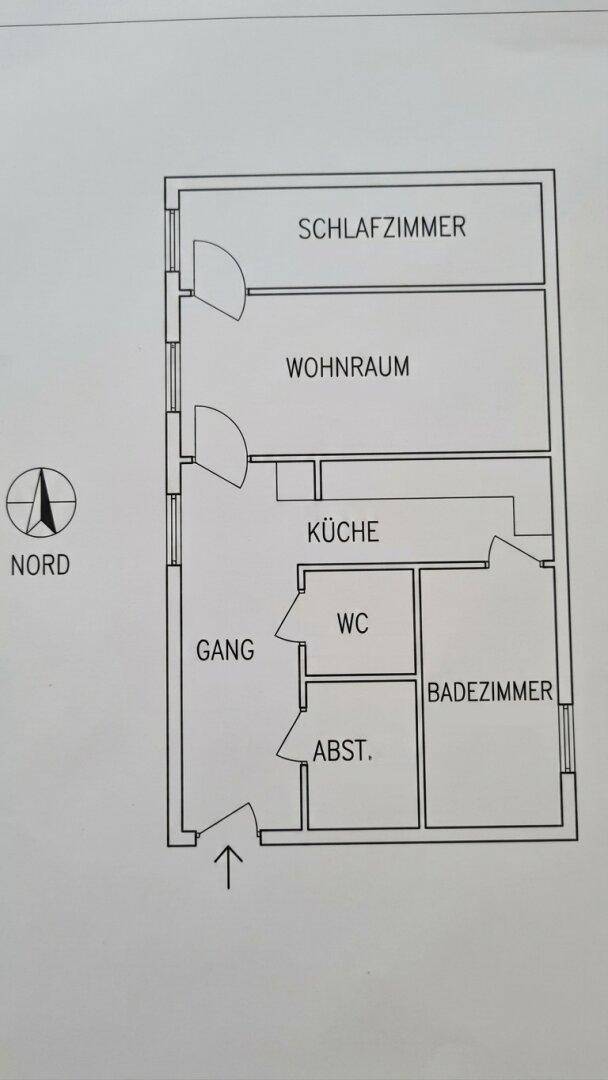 Grundriss der Wohnung mit Schlafzimmer, Wohnraum, Küche, Bad und separatem WC.