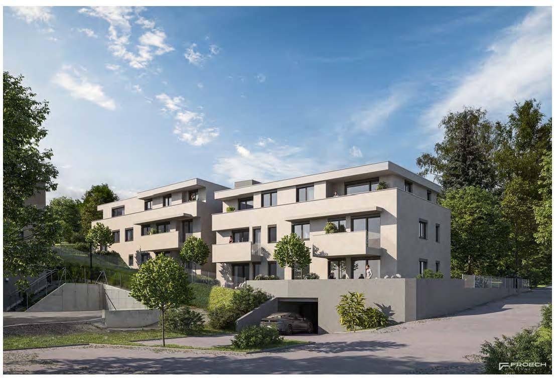 Moderne Wohnanlage mit Tiefgaragenzufahrt, umgeben von Bäumen und Grünflächen.