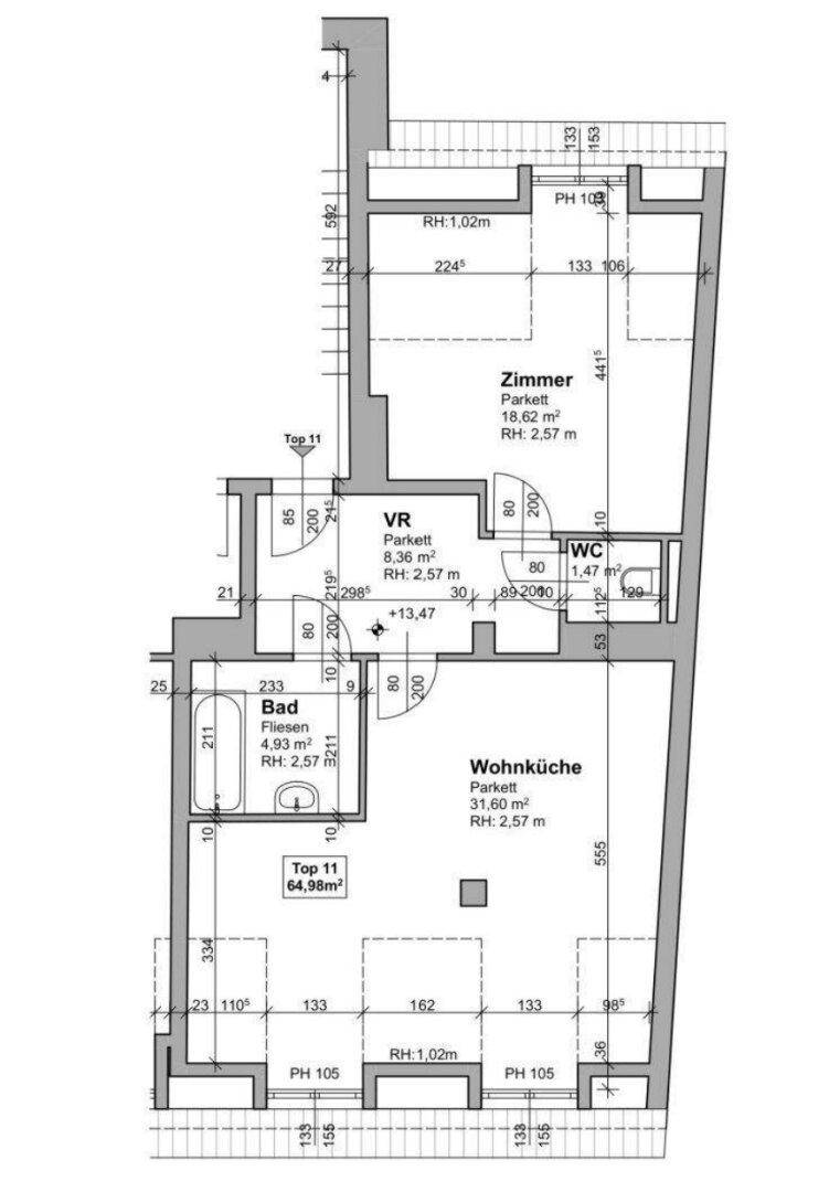 Grundriss der Wohnung mit Wohnküche, Bad, WC und Zimmer, zeigt die Raumaufteilung.