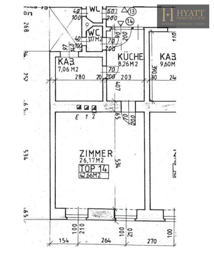 Grundriss der Wohnung mit separatem WC, Küche und einem großen Zimmer.