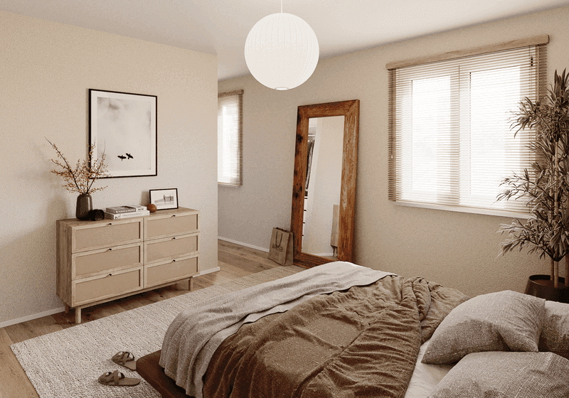 Helles Schlafzimmer mit Holzboden, großem Bett und minimalistischer, moderner Einrichtung.