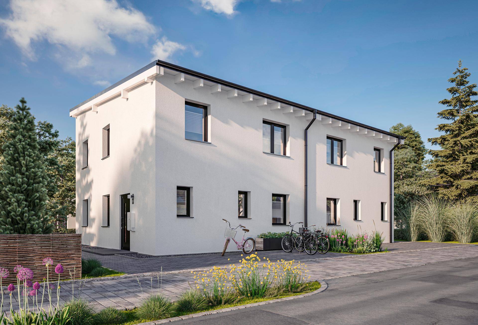 Moderne Doppelhaushälfte mit weißer Fassade und gepflastertem Vorplatz, umgeben von Grünflächen.