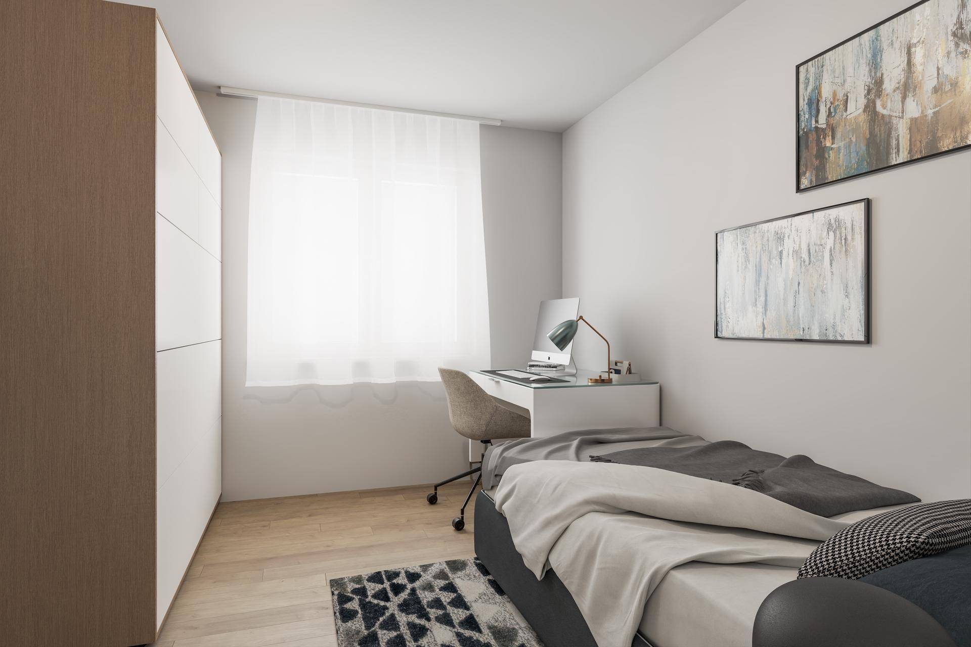Funktionales Schlafzimmer mit Einzelbett, Schreibtisch und hellem Holzboden.