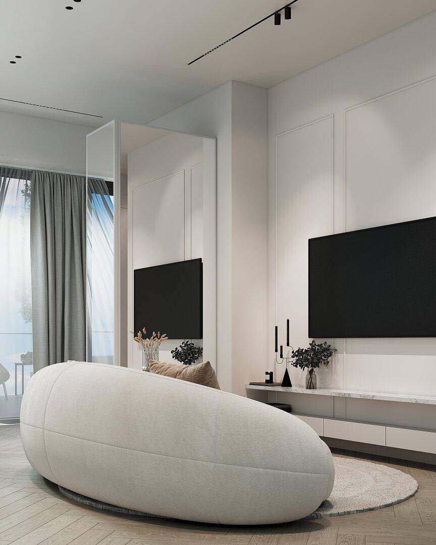 Modernes Wohnzimmer mit einzigartigem Sofa, minimalistischer Dekoration und großem Fernseher.