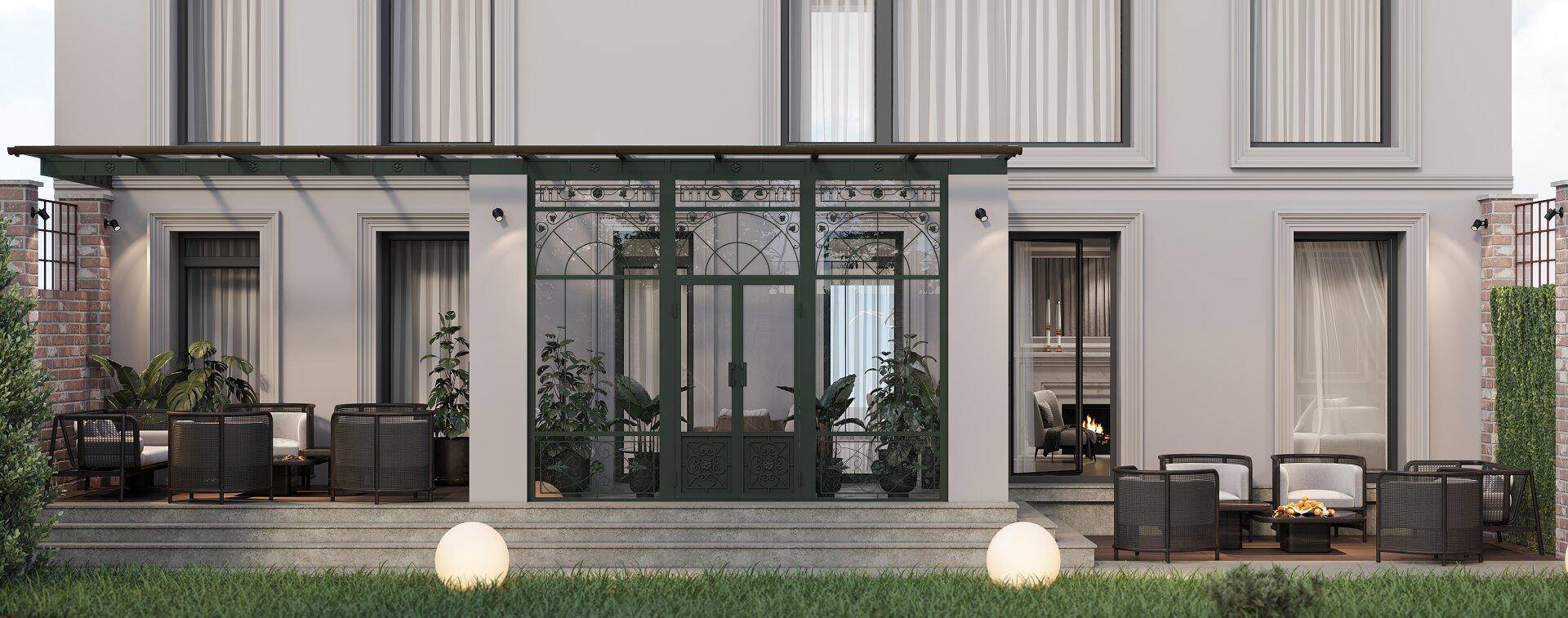 Elegante Gebäudefassade mit einer möblierten Terrasse und einem verglasten Wintergartenbereich.