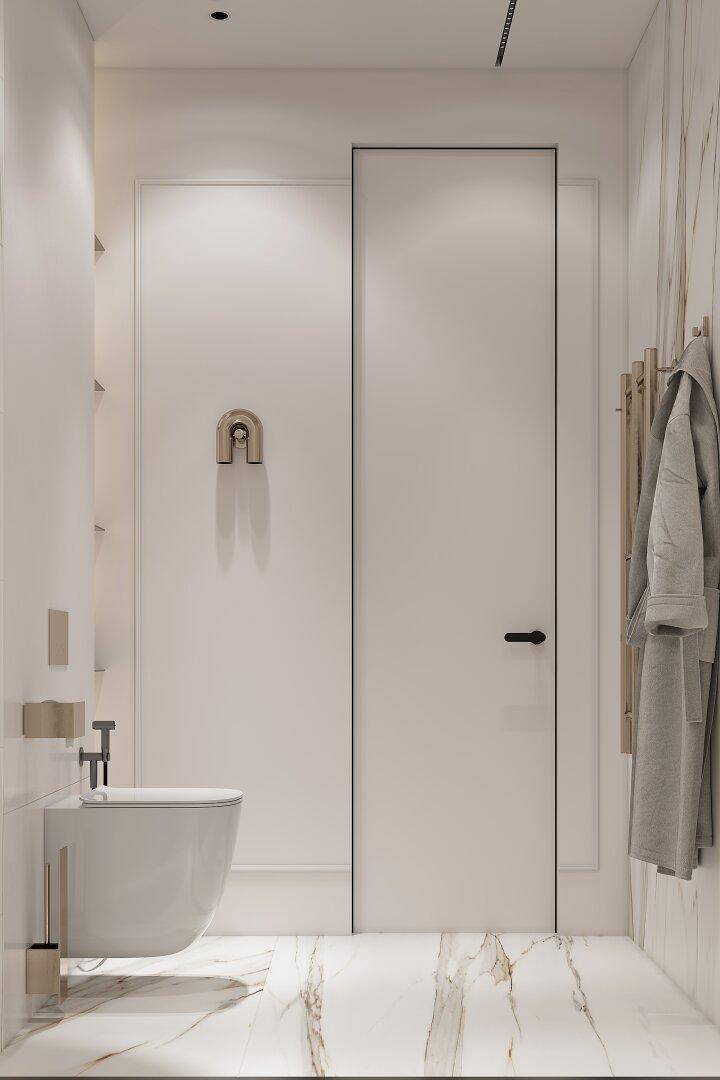 Modernes Badezimmer mit wandhängendem WC, Bidet und stilvollem Marmorboden.