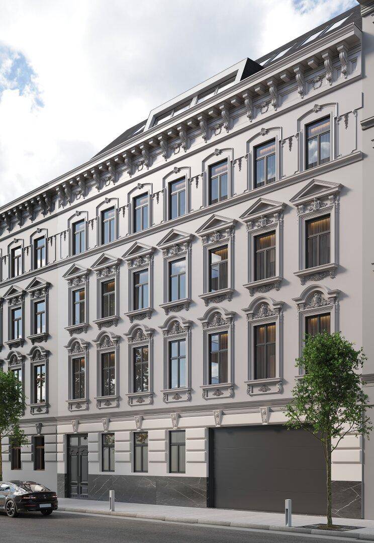 Klassische Fassade eines eleganten Gebäudes bei Tageslicht mit vielen Fenstern und Verzierungen.
