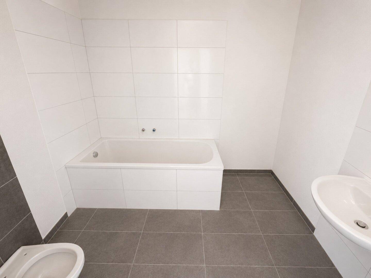 Neubau: Stilvolle Wohnung in bester Lage mit Küche - Ansicht 4