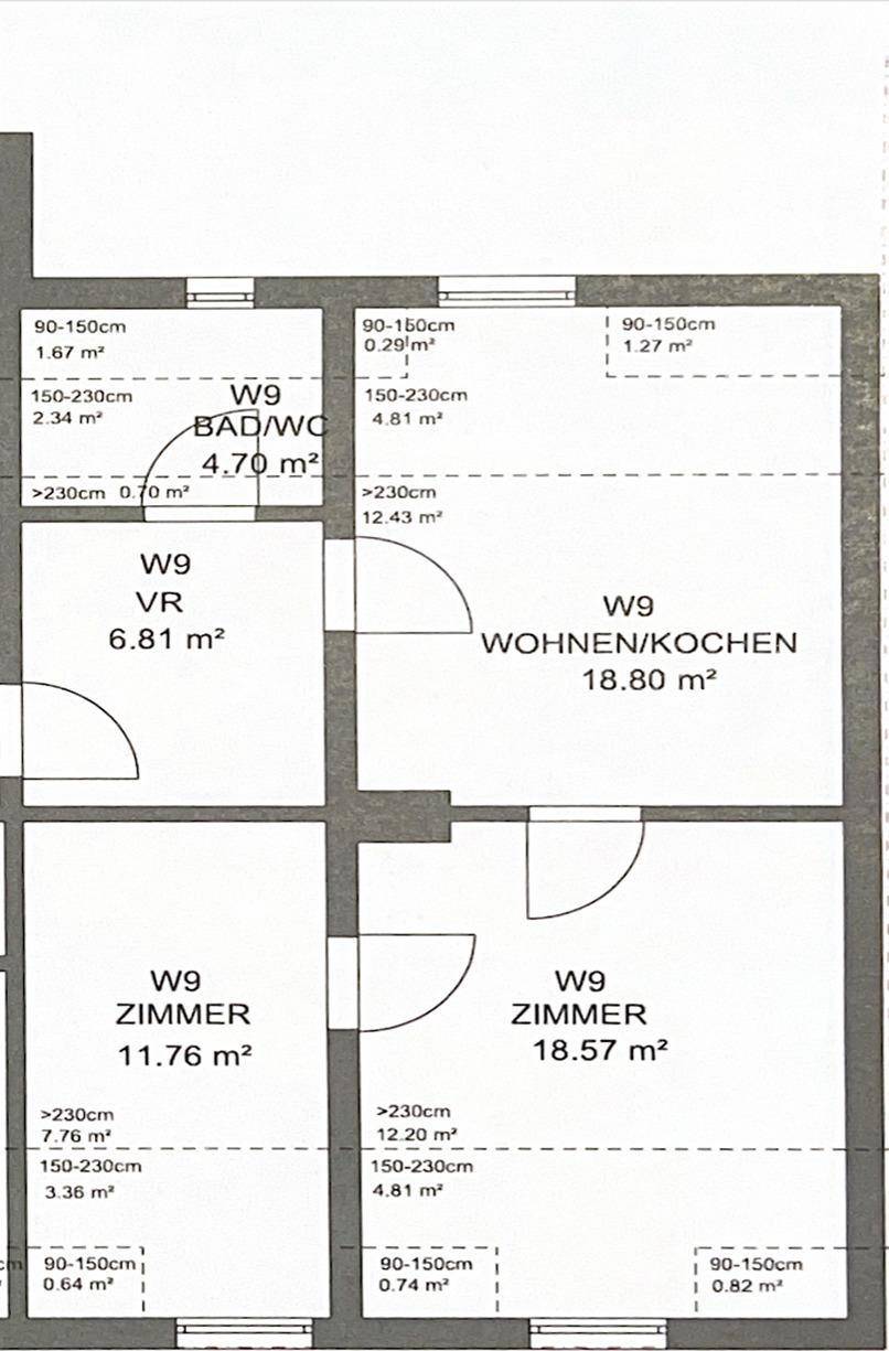 Grundriss der Dachgeschosswohnung mit Wohn-/Kochbereich, Bad und zwei Zimmern.