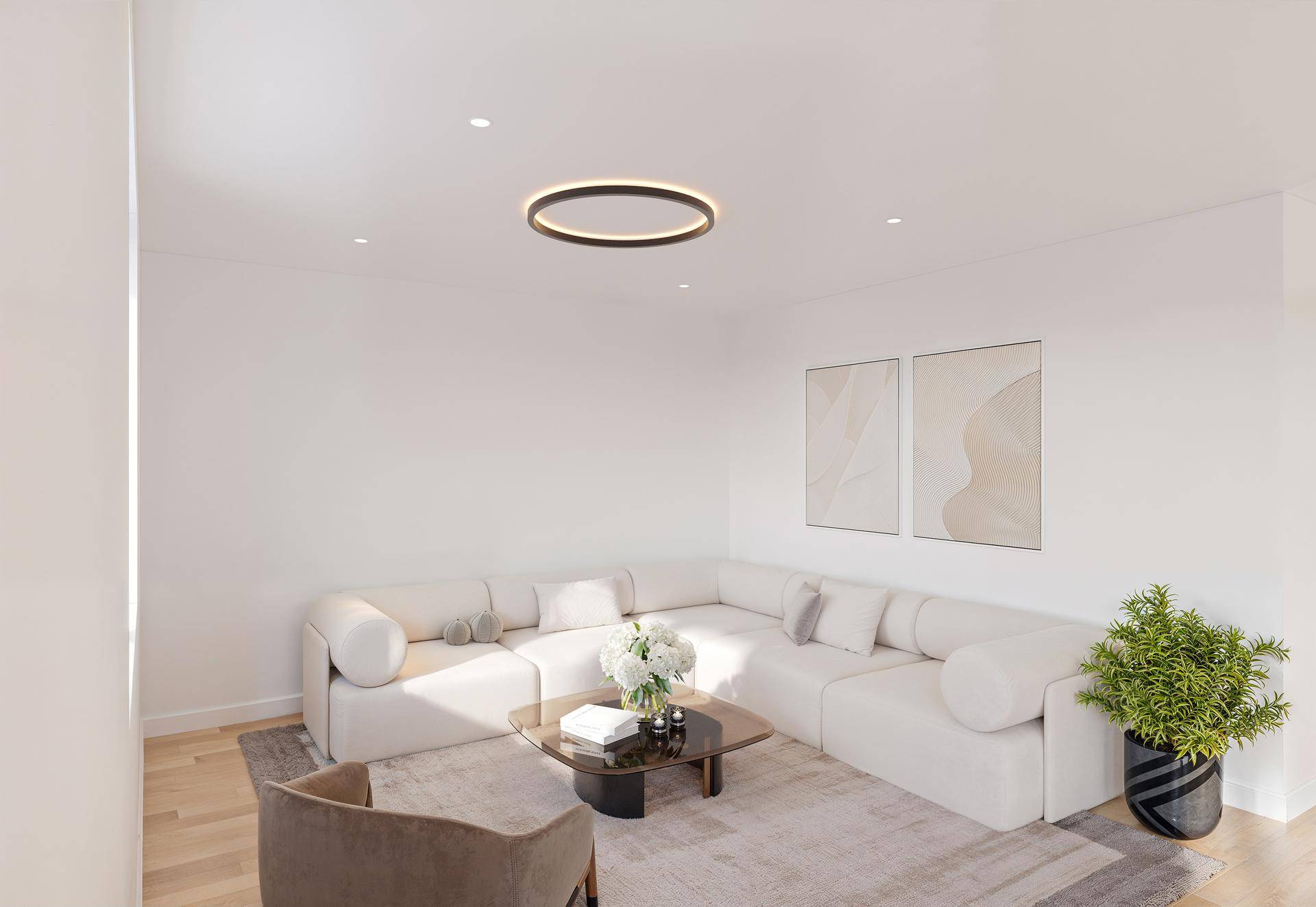 Helles Wohnzimmer mit großem Ecksofa, modernem Couchtisch und minimalistischer Dekoration.