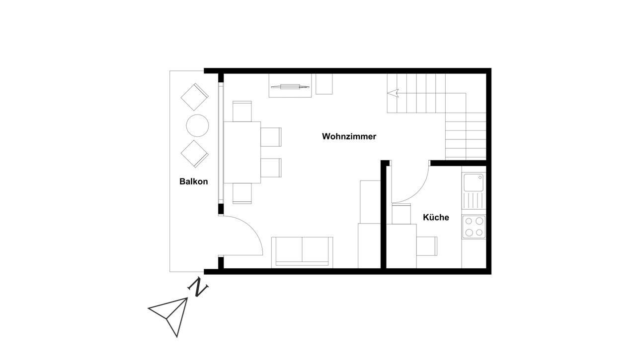 Grundriss des Wohnbereichs mit Küche und Balkon.