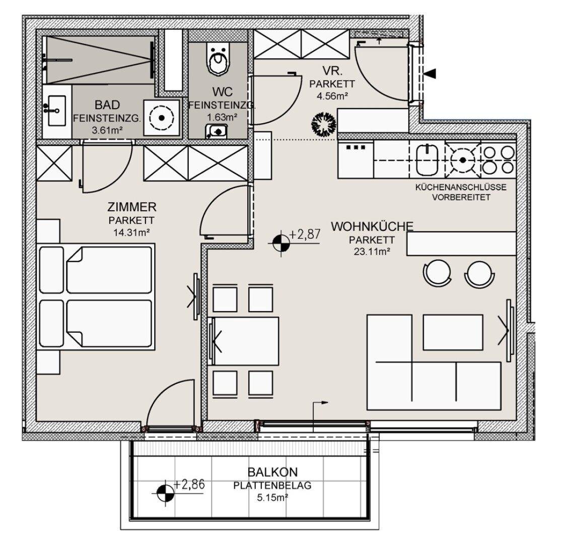 Grundriss einer Wohnung mit Wohnküche, Schlafzimmer, Bad, separatem WC und Balkon.