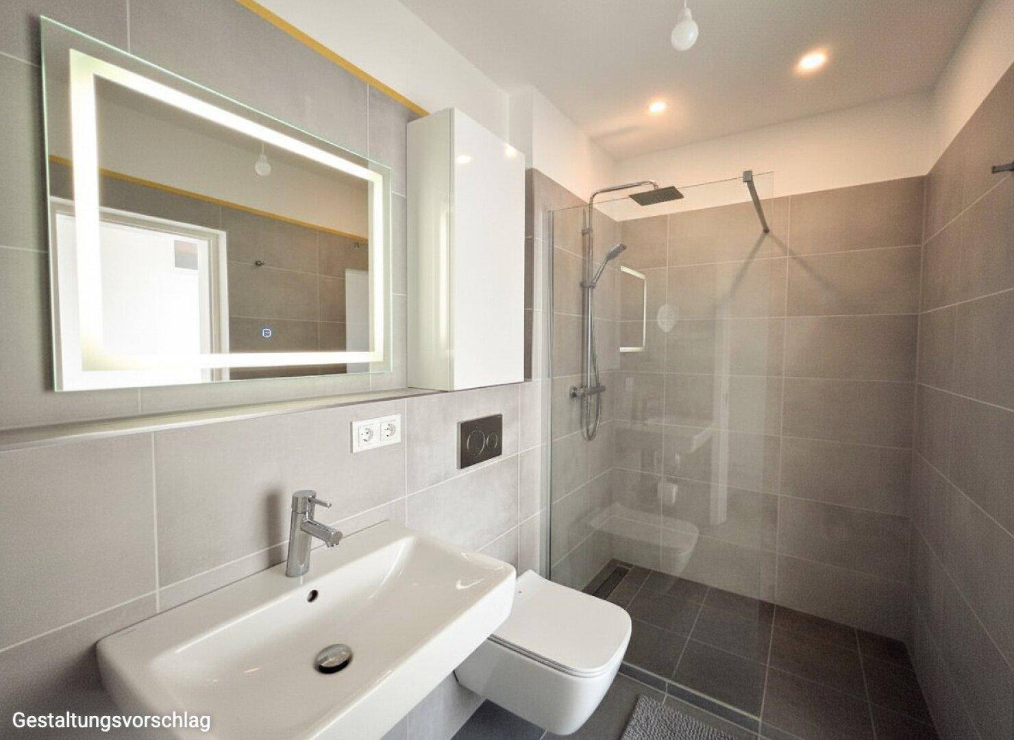Zeitgemäßes Badezimmer mit grauen Fliesen, bodengleicher Dusche und wandhängendem WC.