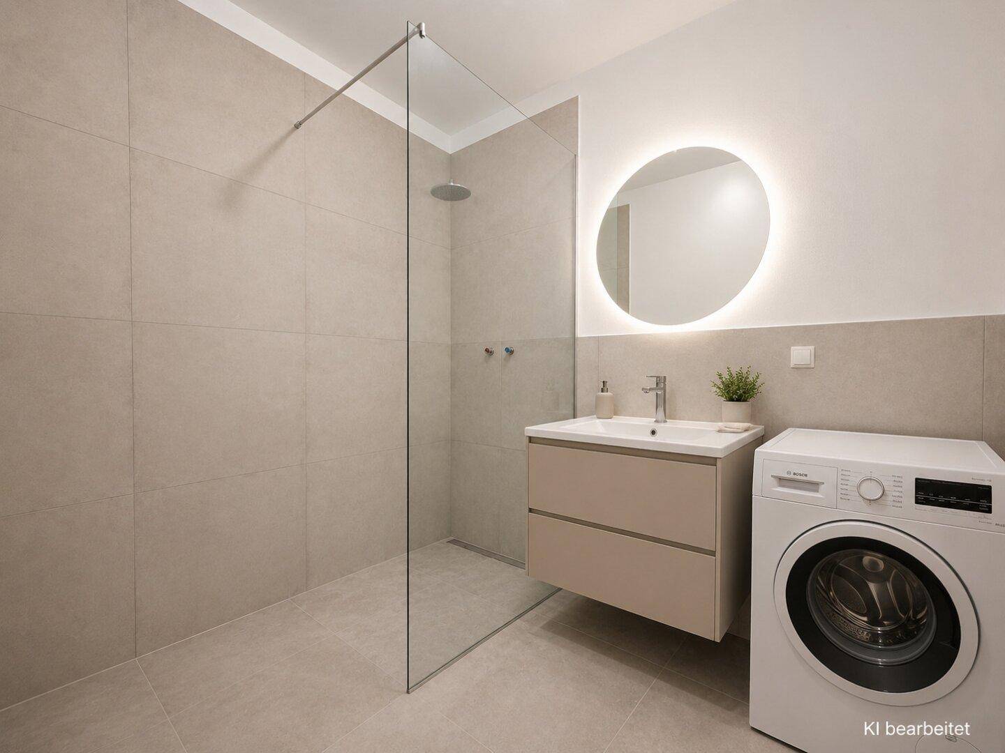 Modernes Badezimmer mit begehbarer Dusche, Waschbecken und Waschmaschine.