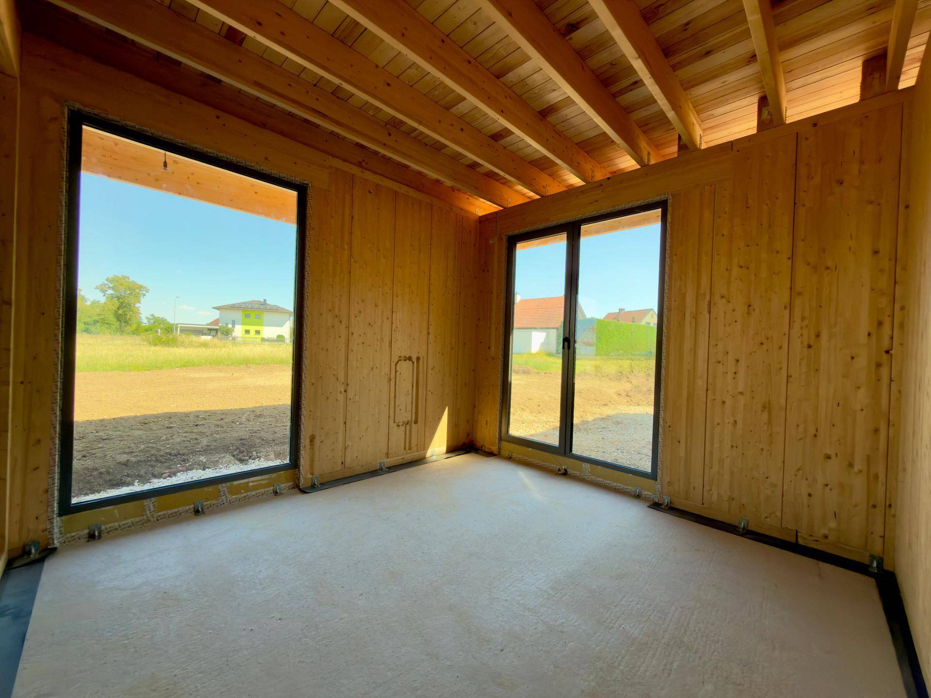 Moderner Design-Bungalow in nachhaltiger Massivholzbauweise – Exklusives Wohnen auf einer Ebene mit 203 m² Nutzfläche - Ansicht 4