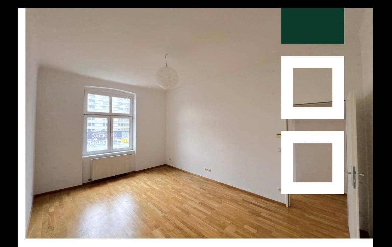 Helles Wohnzimmer mit Holzfußboden und großem Fenster.