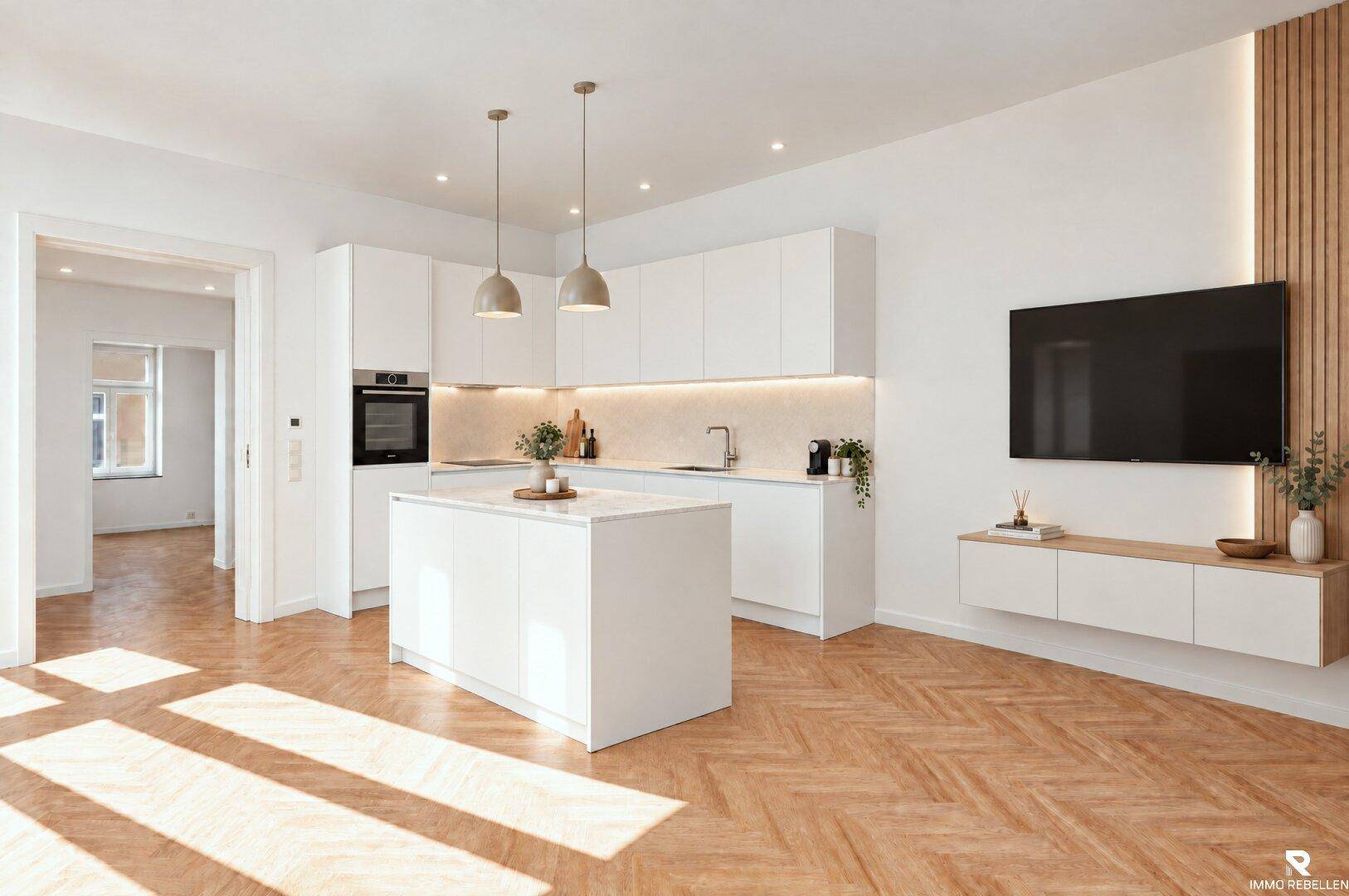 Moderne offene Küche mit weißer Kücheninsel, Einbaugeräten und Fischgrätparkettboden.