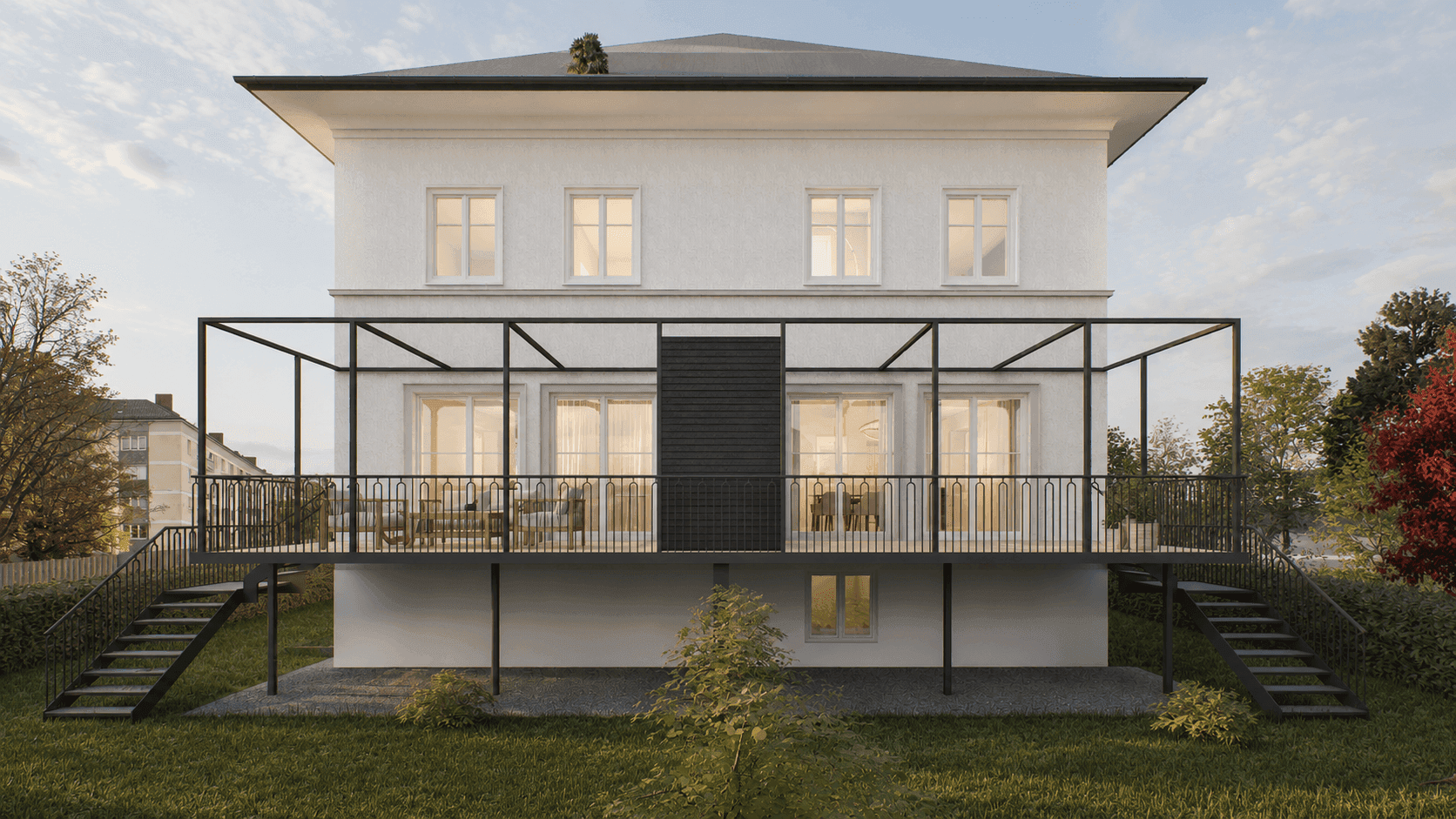 Rückansicht des Hauses mit großer, moderner Balkonkonstruktion und Zugang zum grünen Garten.
