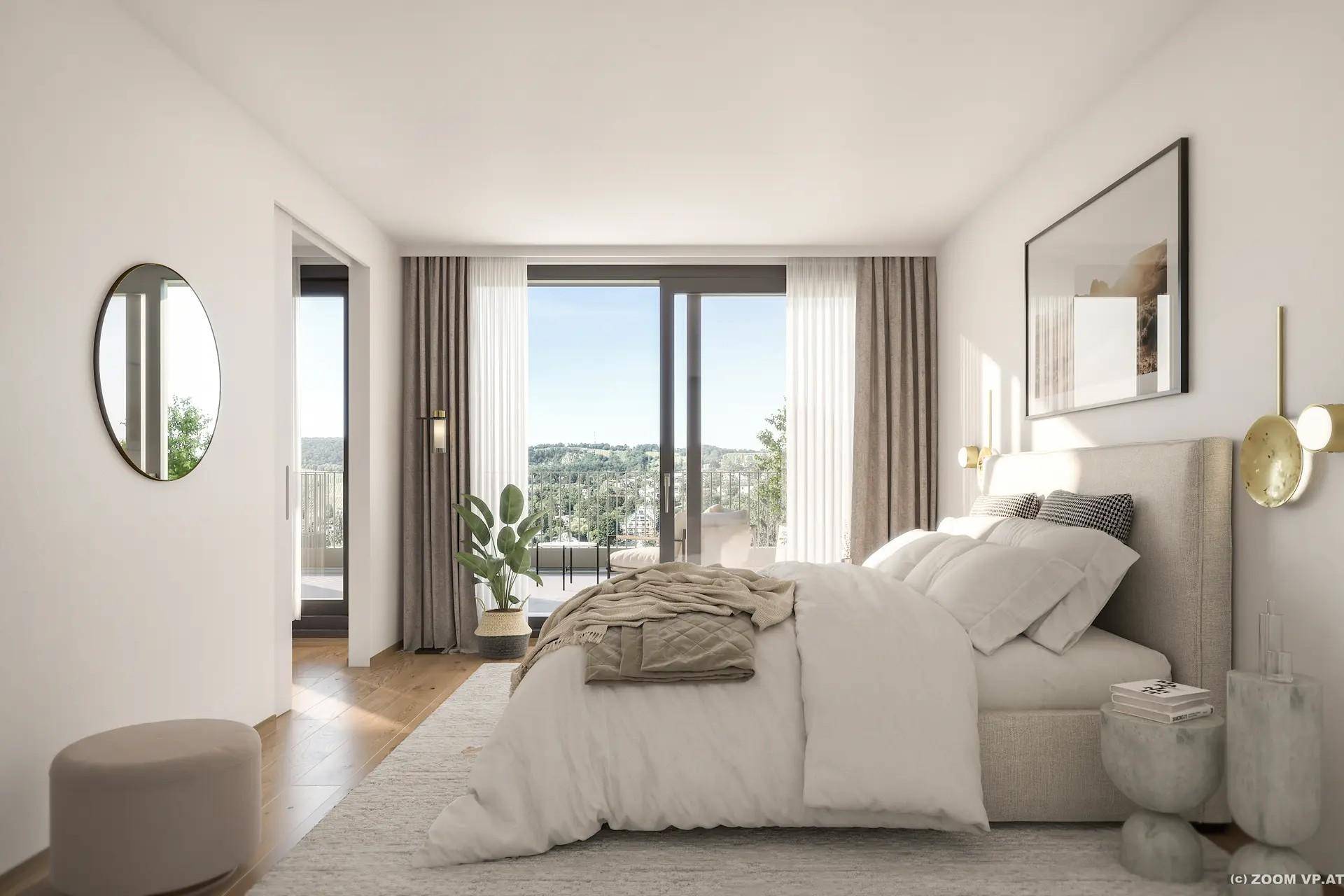 Modernes Schlafzimmer mit großem Bett, Holzboden und Zugang zu einem Balkon mit Weitblick.