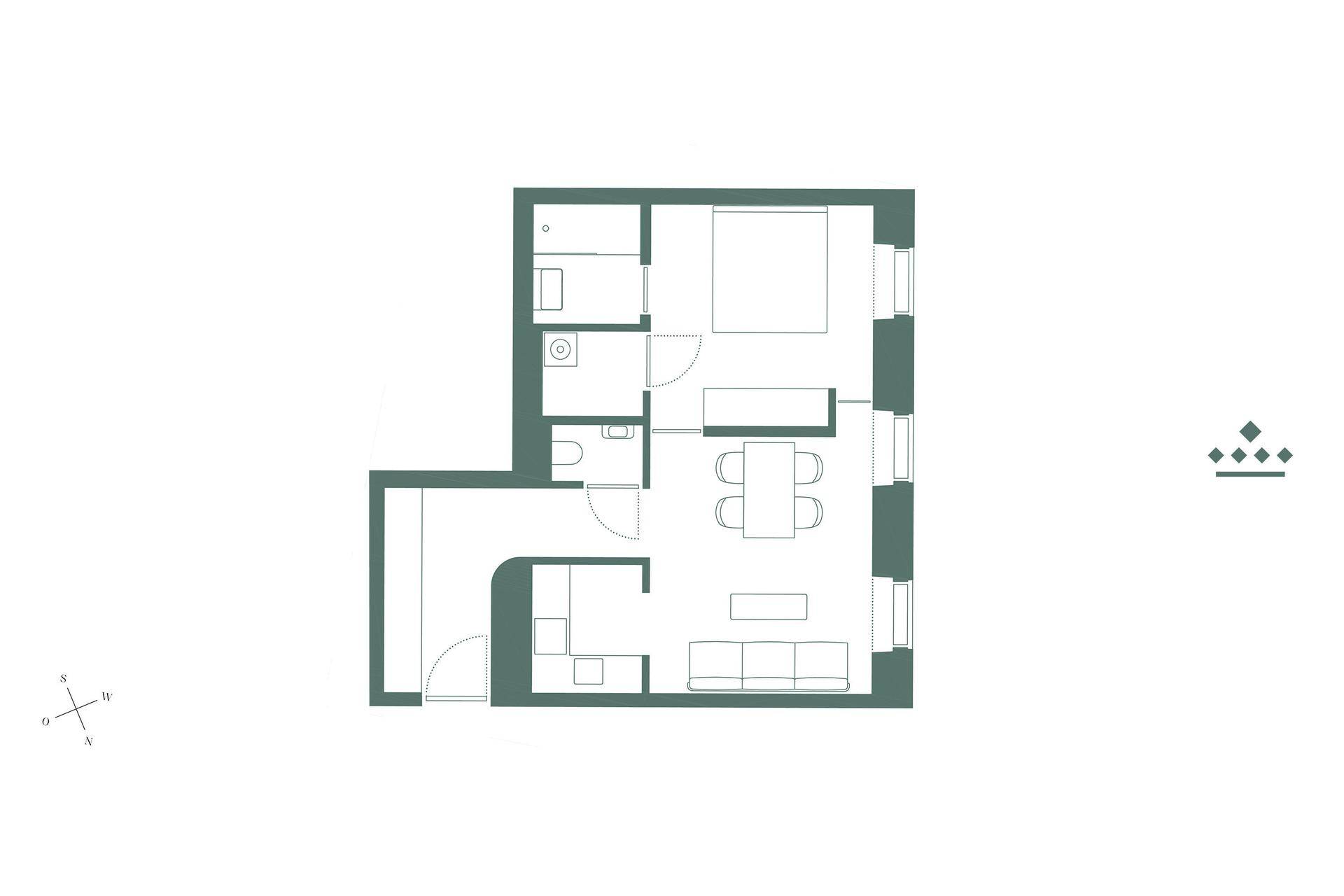 Grundriss einer Wohnung mit Schlafzimmer, Bad und offenem Wohnbereich.