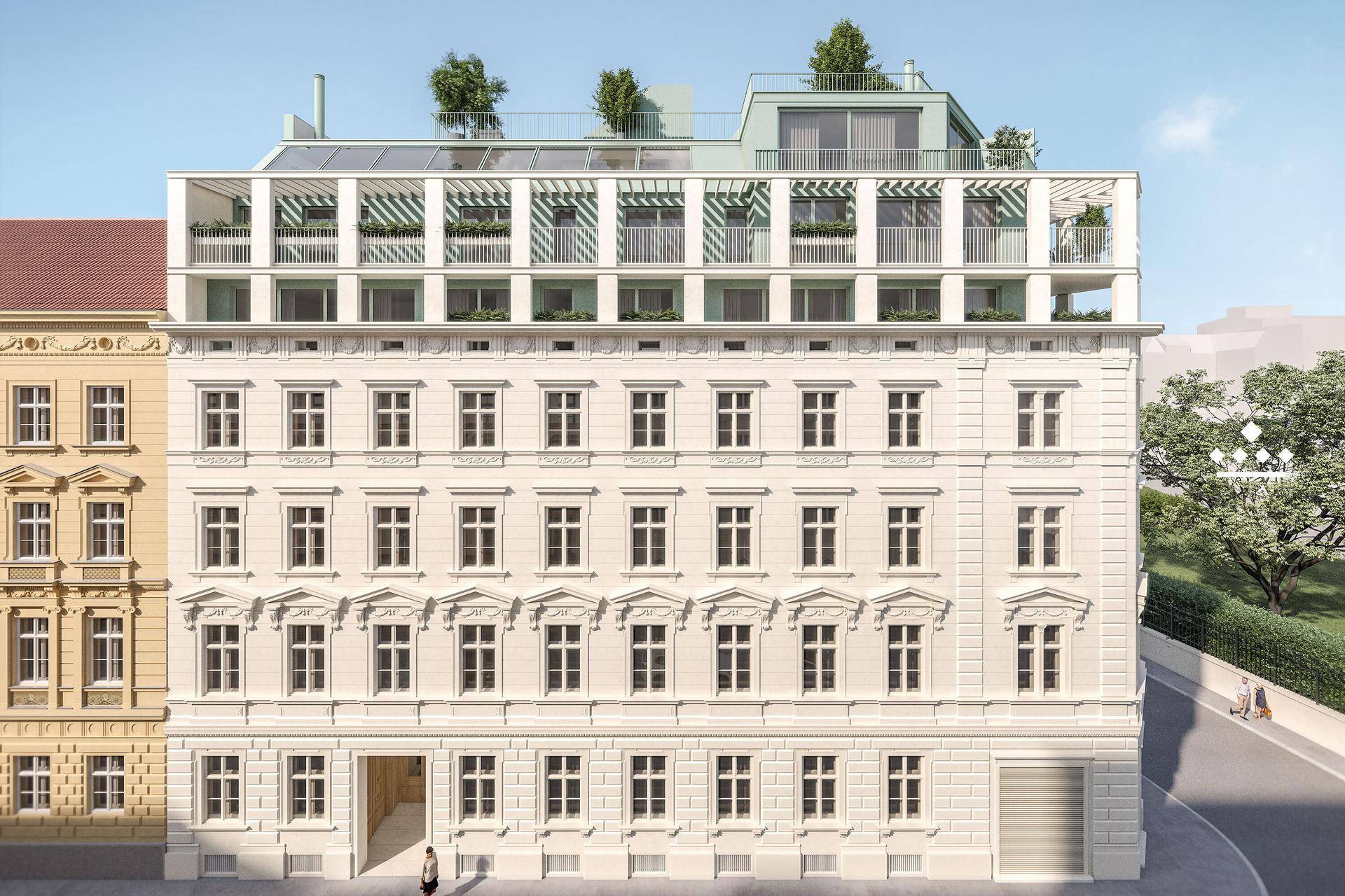Historische Fassade eines Gebäudes mit moderner Dachaufstockung und begrünten Terrassen.