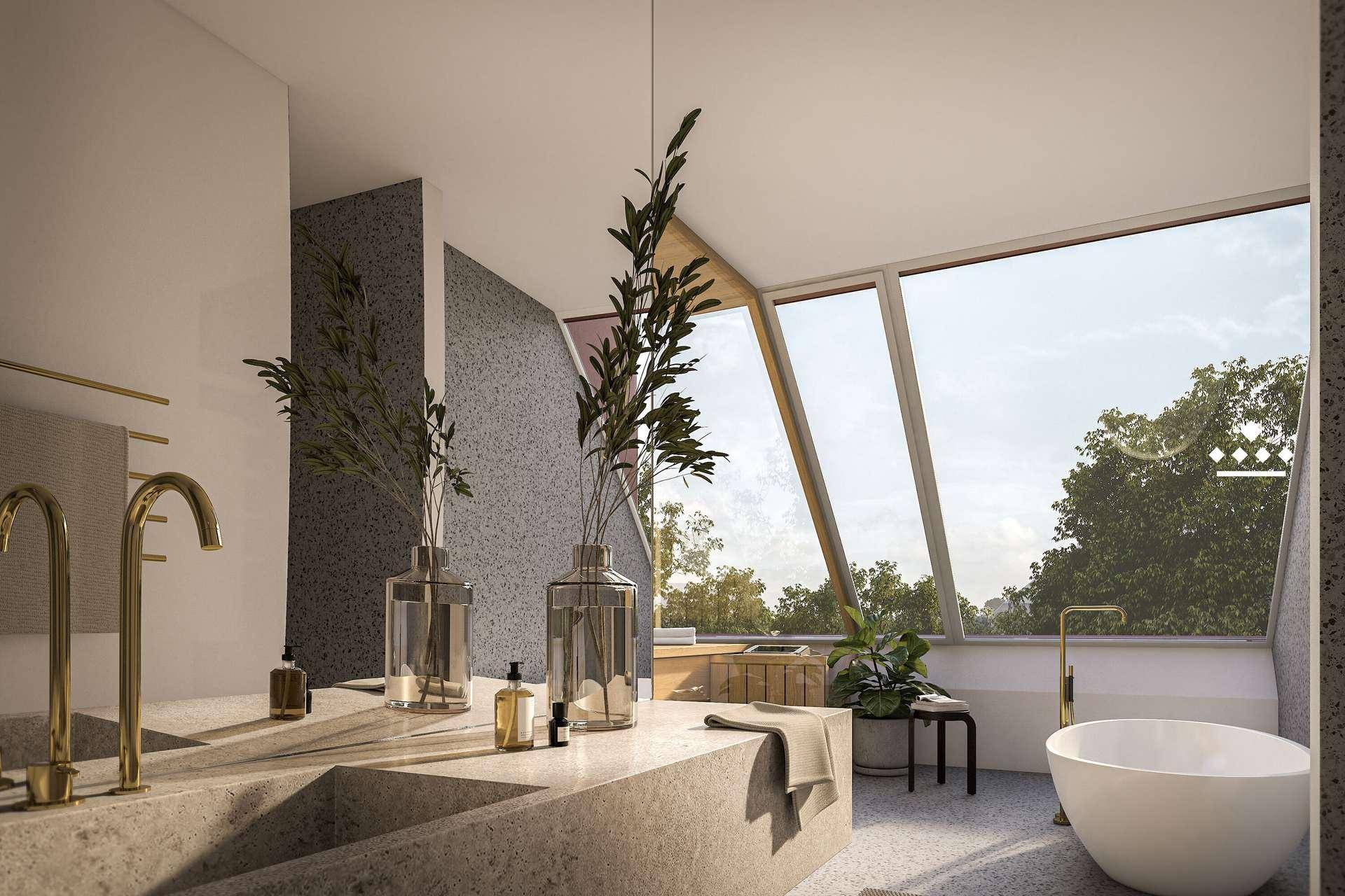 Luxuriöses Badezimmer mit freistehender Badewanne, Doppelwaschbecken und großen Dachfenstern.