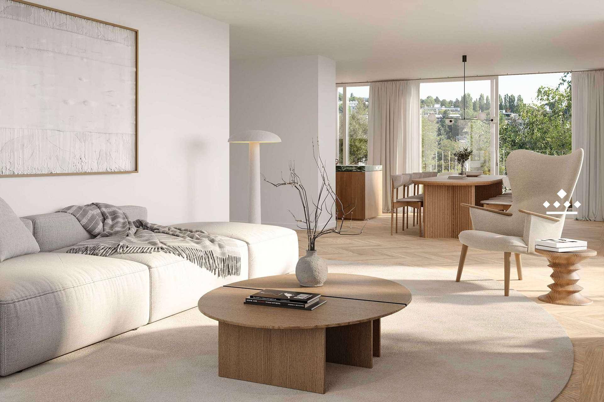 Geräumiger Wohnbereich mit hellem Sofa, Couchtisch und Blick auf den angrenzenden Essbereich.