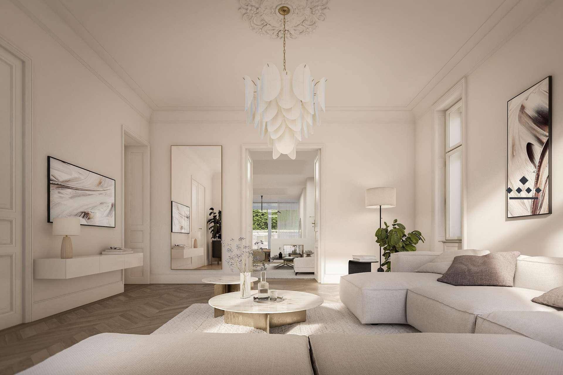 Elegantes Wohnzimmer mit Stuckdecke, modernem Sofa und großem Spiegel, hell und einladend.
