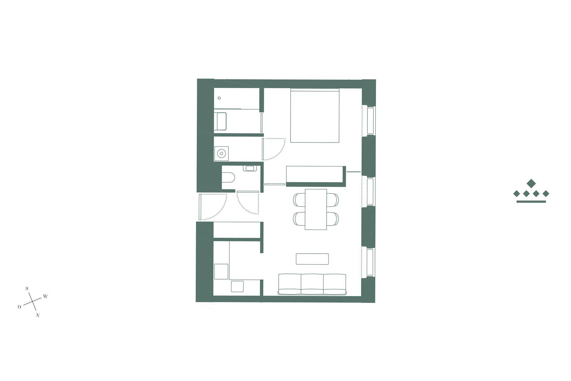 Grundriss einer Wohnung mit Schlafzimmer, Bad, Wohnbereich und Küche.