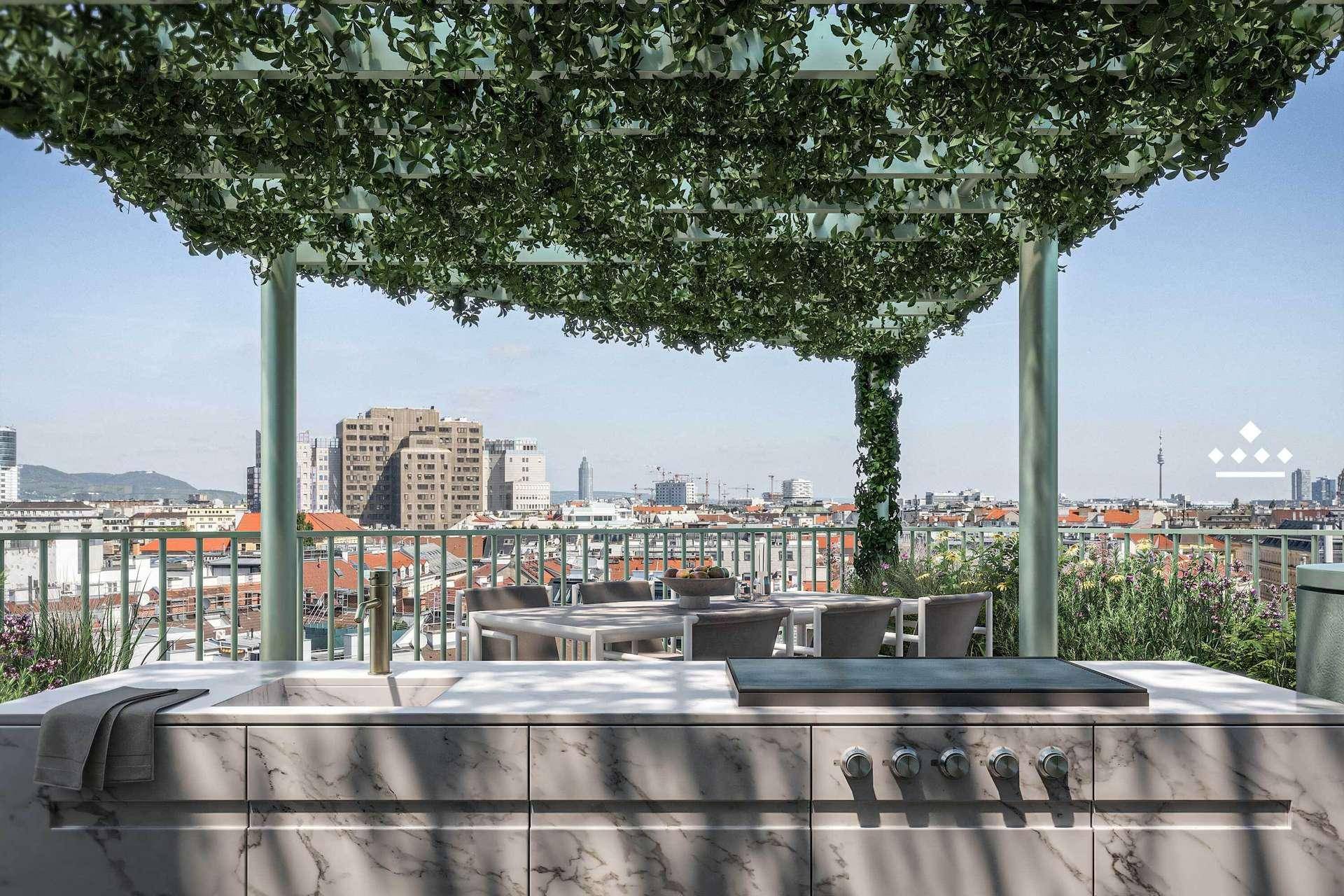 Großzügige Dachterrasse mit Außenküche, Essbereich und weitem Blick über die Stadt.