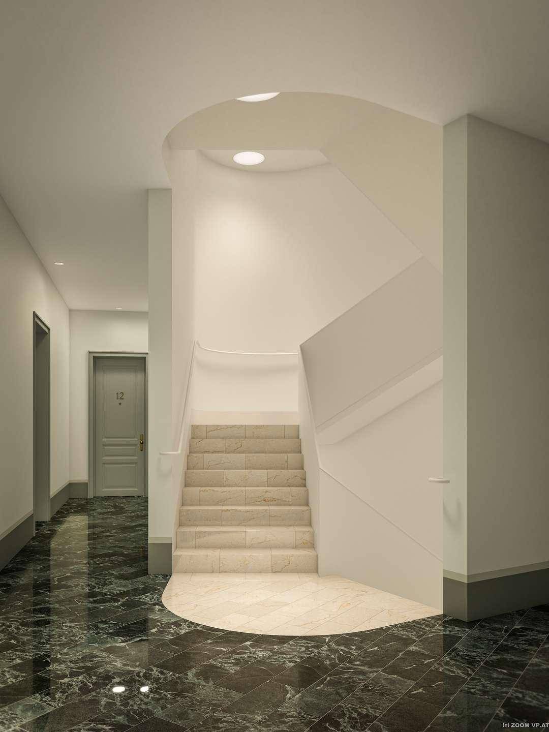 Heller Flur mit eleganter Marmorboden und geschwungener Treppe, die in die oberen Stockwerke führt.