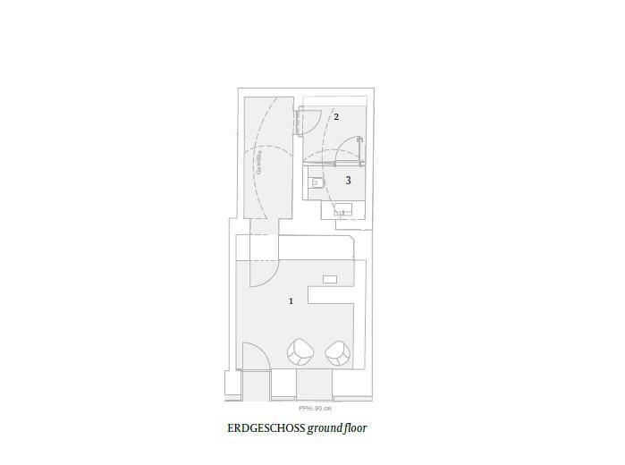 Grundriss des Erdgeschosses mit einem Hauptraum und einem Badezimmer.