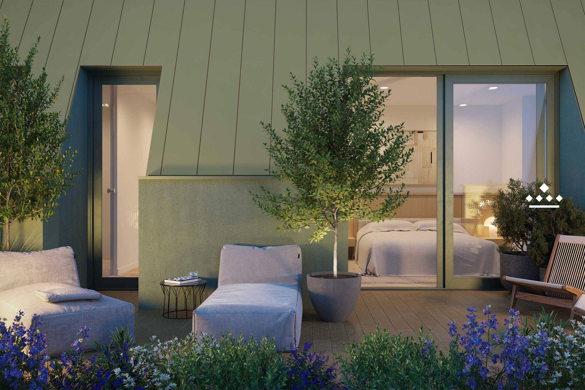 Private Terrasse mit Liegemöglichkeiten und direktem Zugang zum Schlafzimmer.