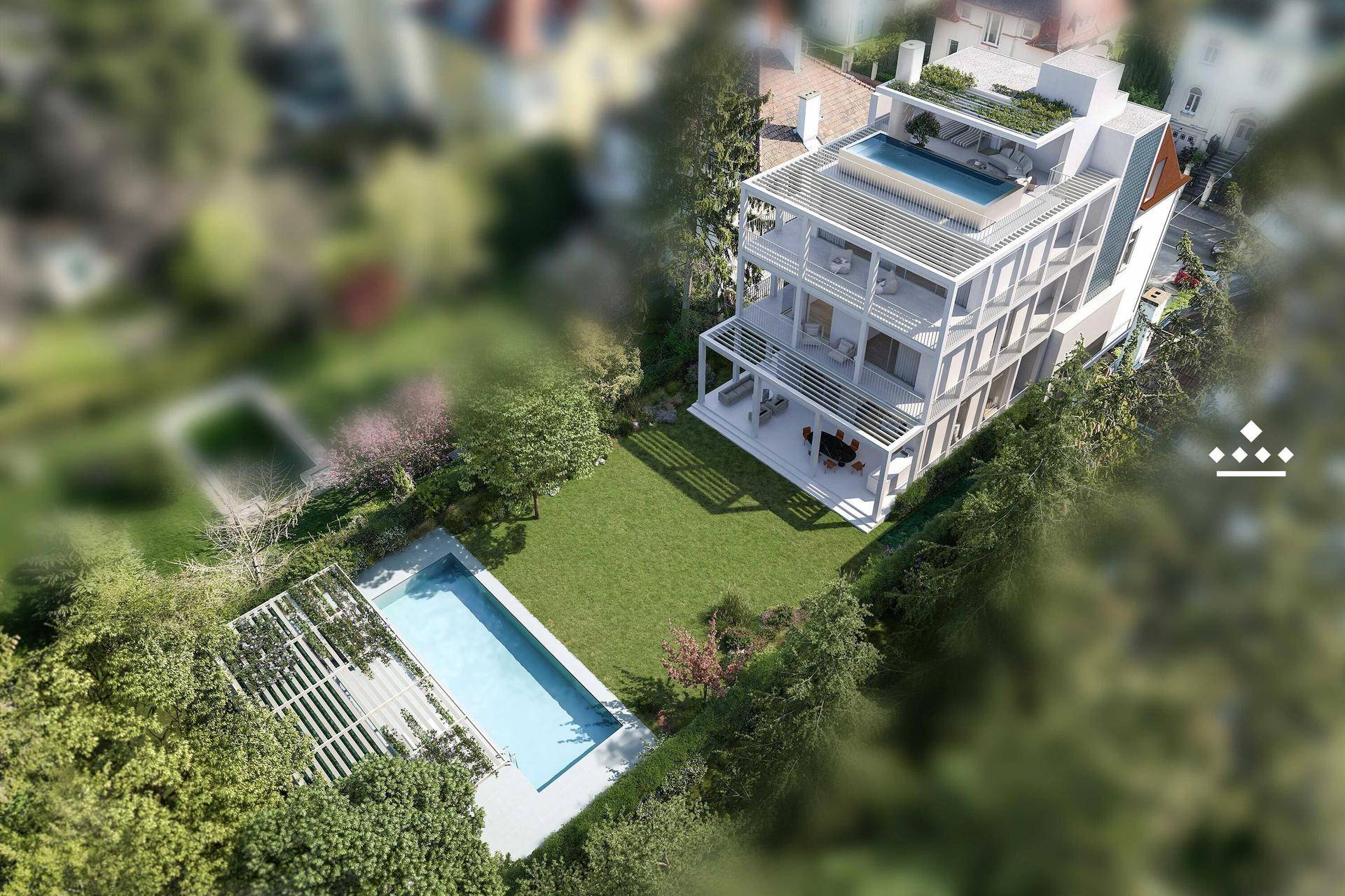 Luftaufnahme der modernen Villa mit großem Garten und zwei Pools.