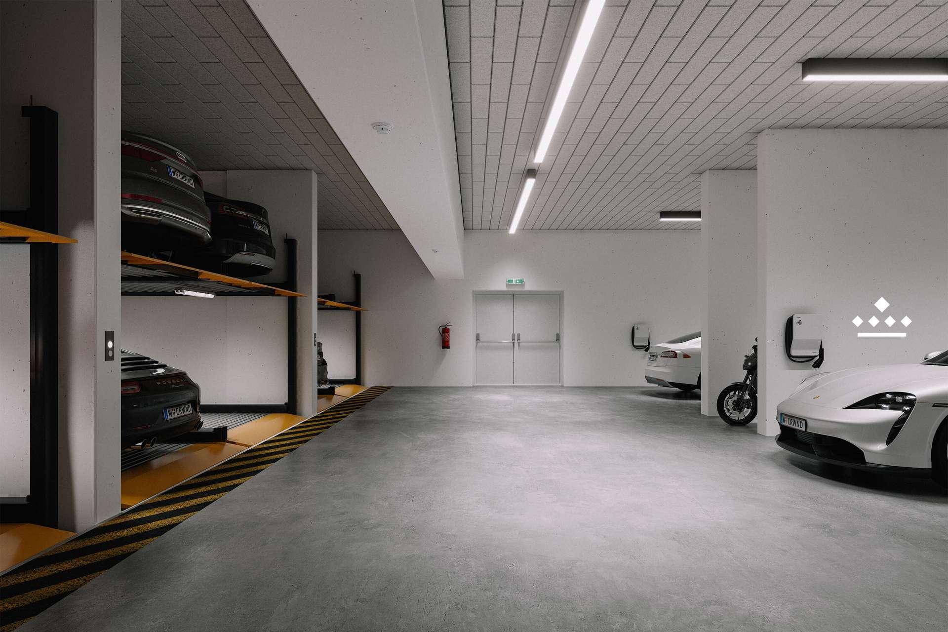 Geräumige Tiefgarage mit Ladestationen für Elektrofahrzeuge und modernen Beleuchtungssystemen.