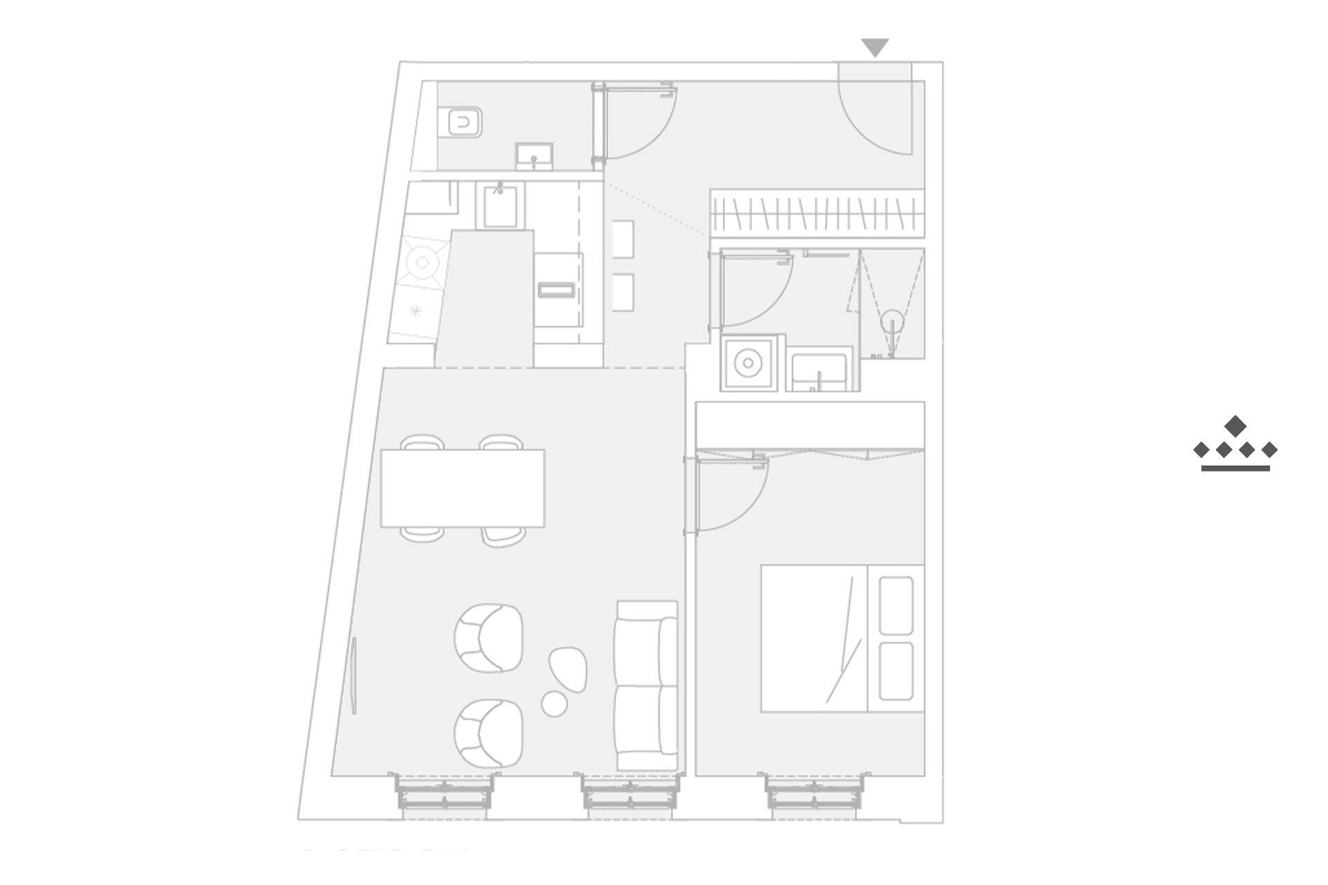 Grundriss einer Wohnung mit offenem Wohnbereich, Schlafzimmer, Bad und separatem WC.