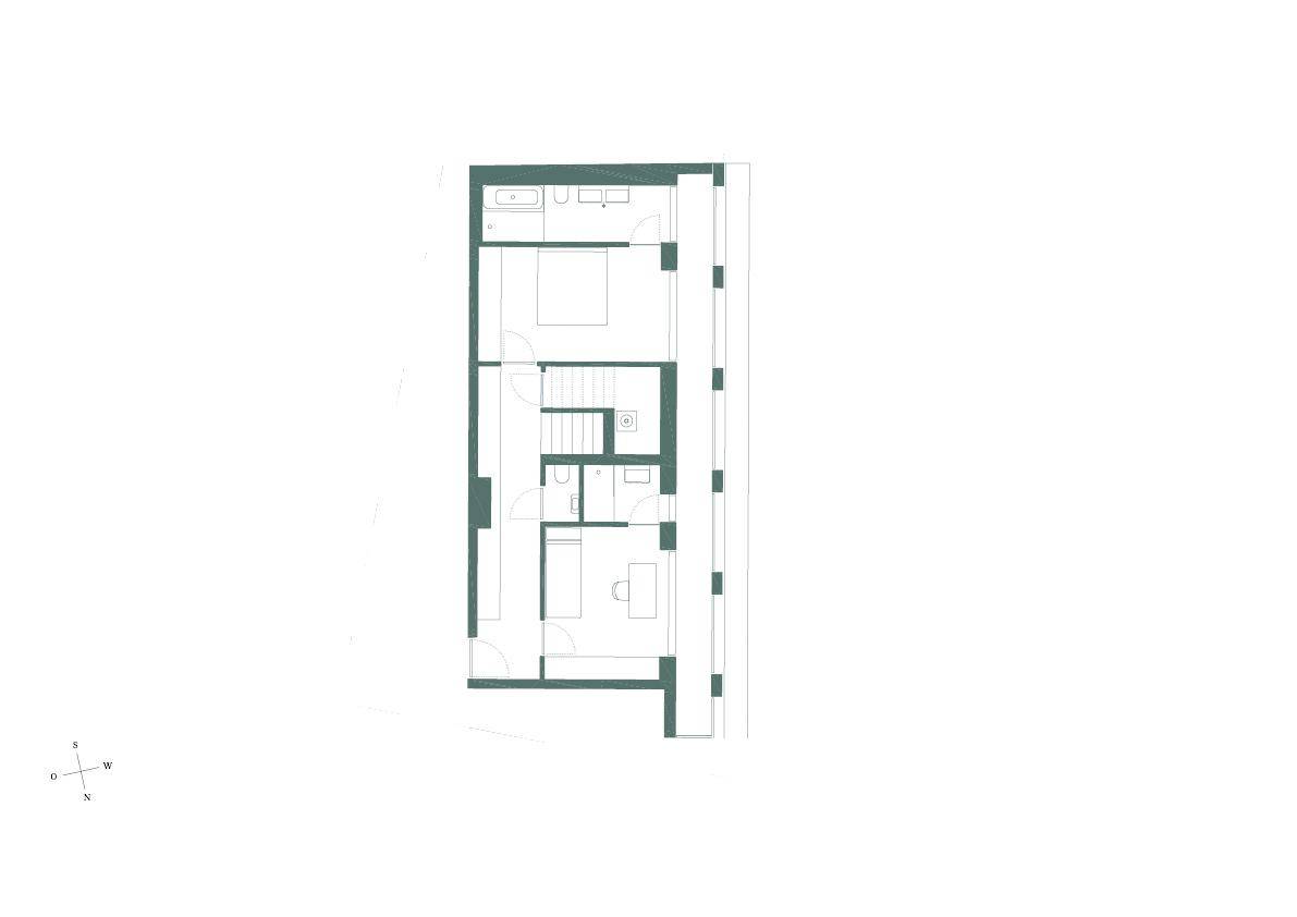 Grundriss einer Wohnung mit Schlafzimmer, Bad und separatem WC.